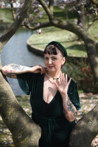 Collier en perles de nacre verte et beige